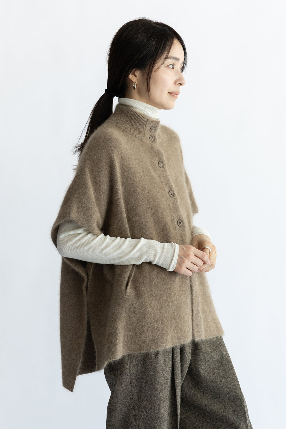 Poncho Neck en laine de raton laveur CT Plage Noir